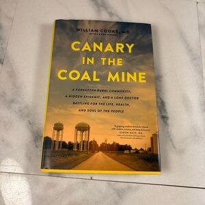 Canary in the Coal Mine Paperback Book - Yellow & Black Cover